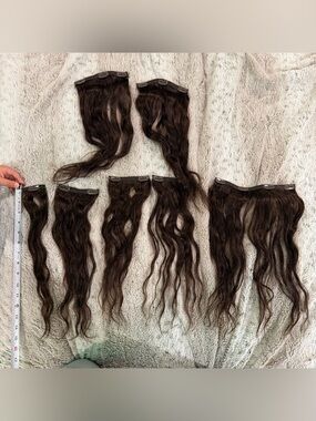 Seven piece 16” clip in real hair extensions